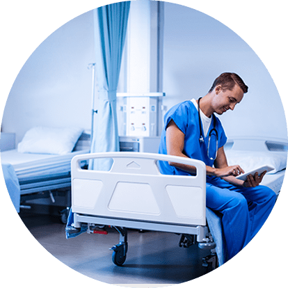 Pediatric healthcare professional reviewing a patient chart
